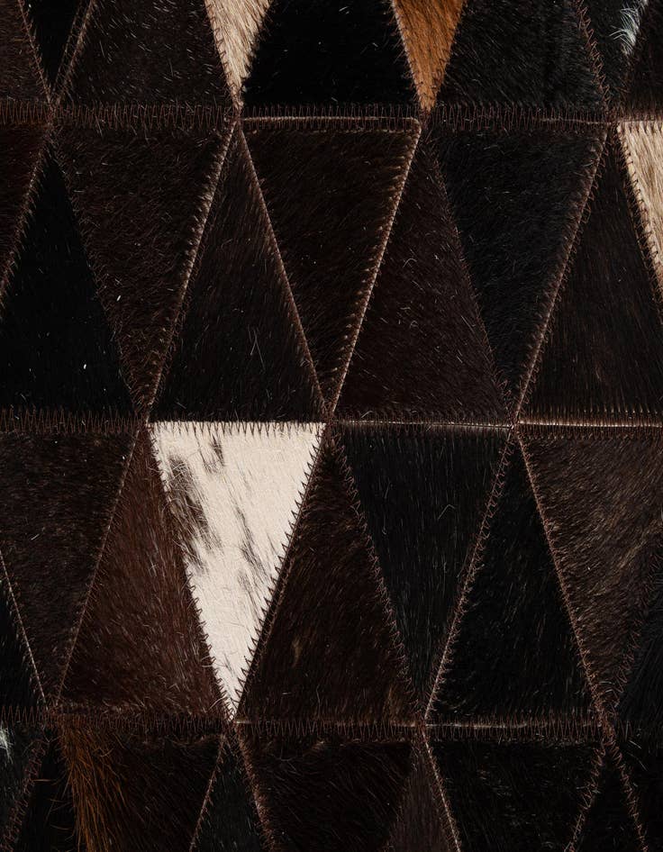 Detail image of  5' 1 x 7' 11 Cowhide - Patchwork Rug