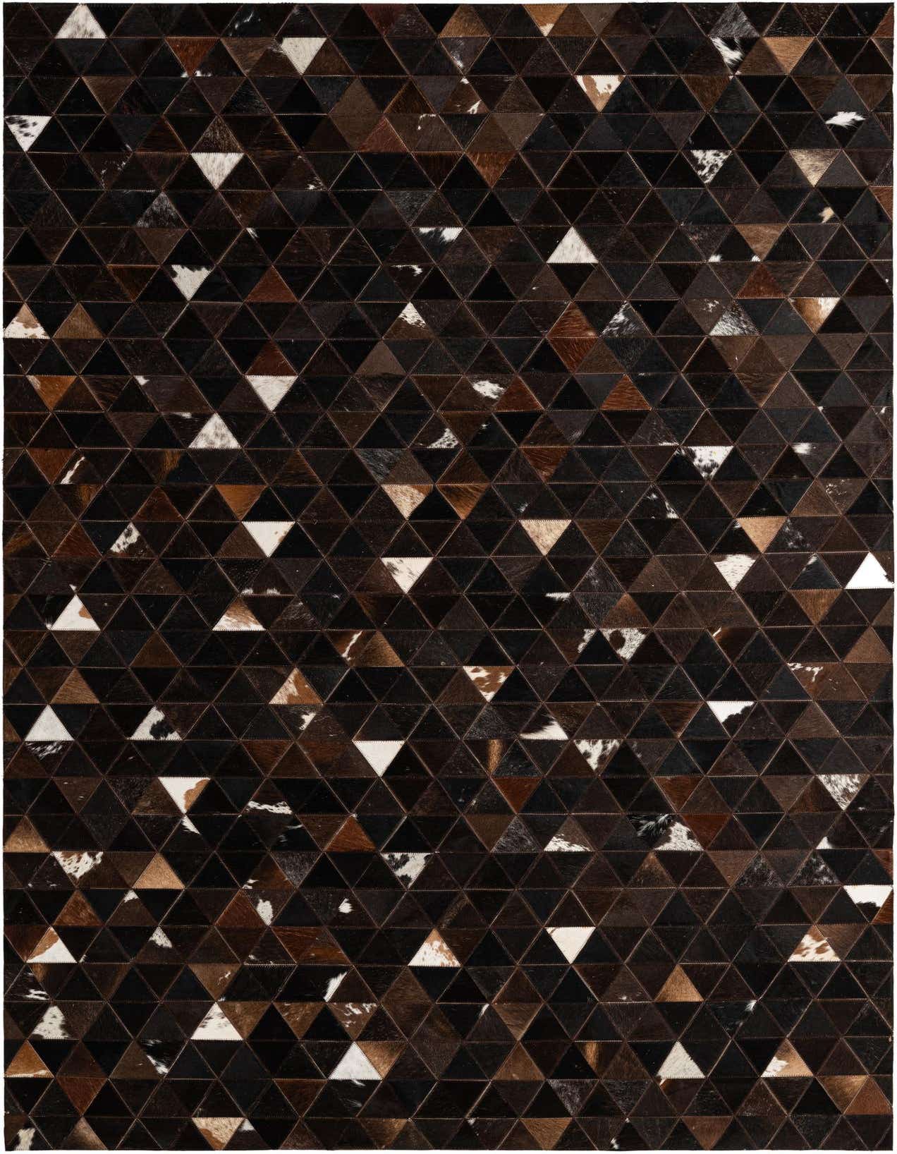A 5x8 rectangular Cowhide - Patchwork rug featuring a modern geometric pattern of brown, tan, black, and white triangular cowhide patches.