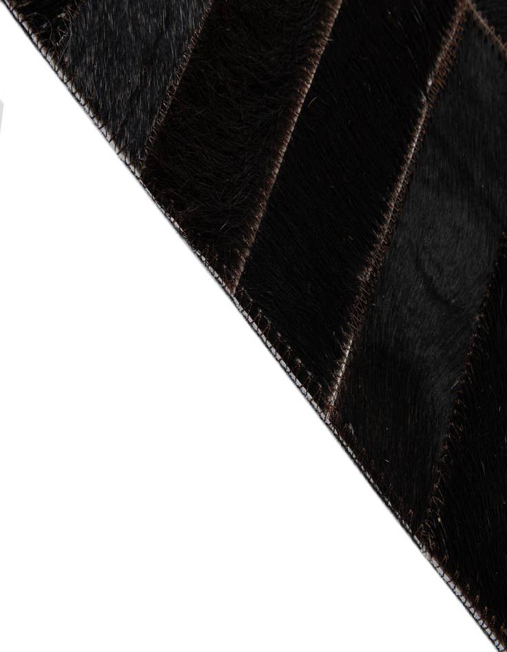 Detail image of  4' 11 x 8' 1 Cowhide - Patchwork Rug