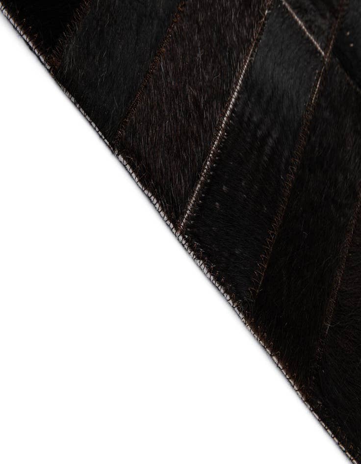 Detail image of  4' 11 x 8' Cowhide - Patchwork Rug