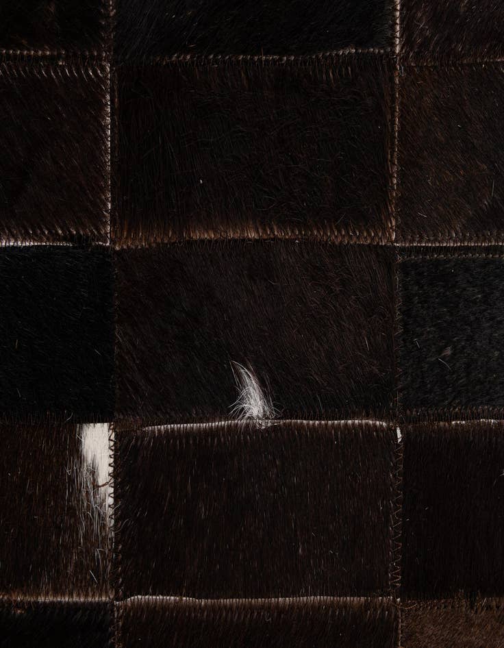 Detail image of  4' 11 x 8' Cowhide - Patchwork Rug