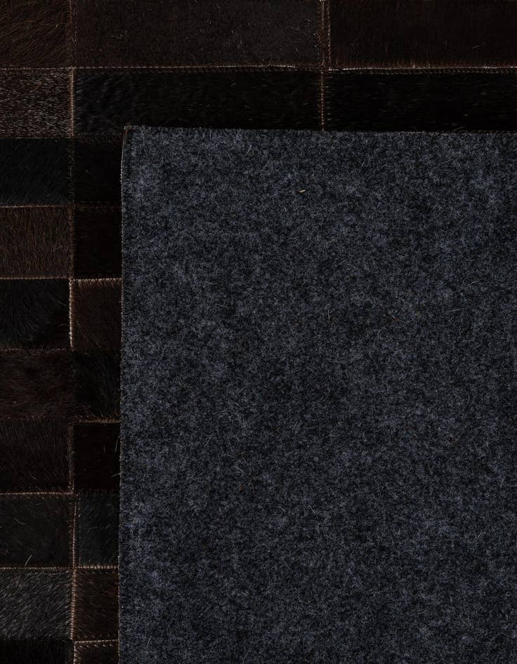 Detail image of  4' 11 x 8' Cowhide - Patchwork Rug