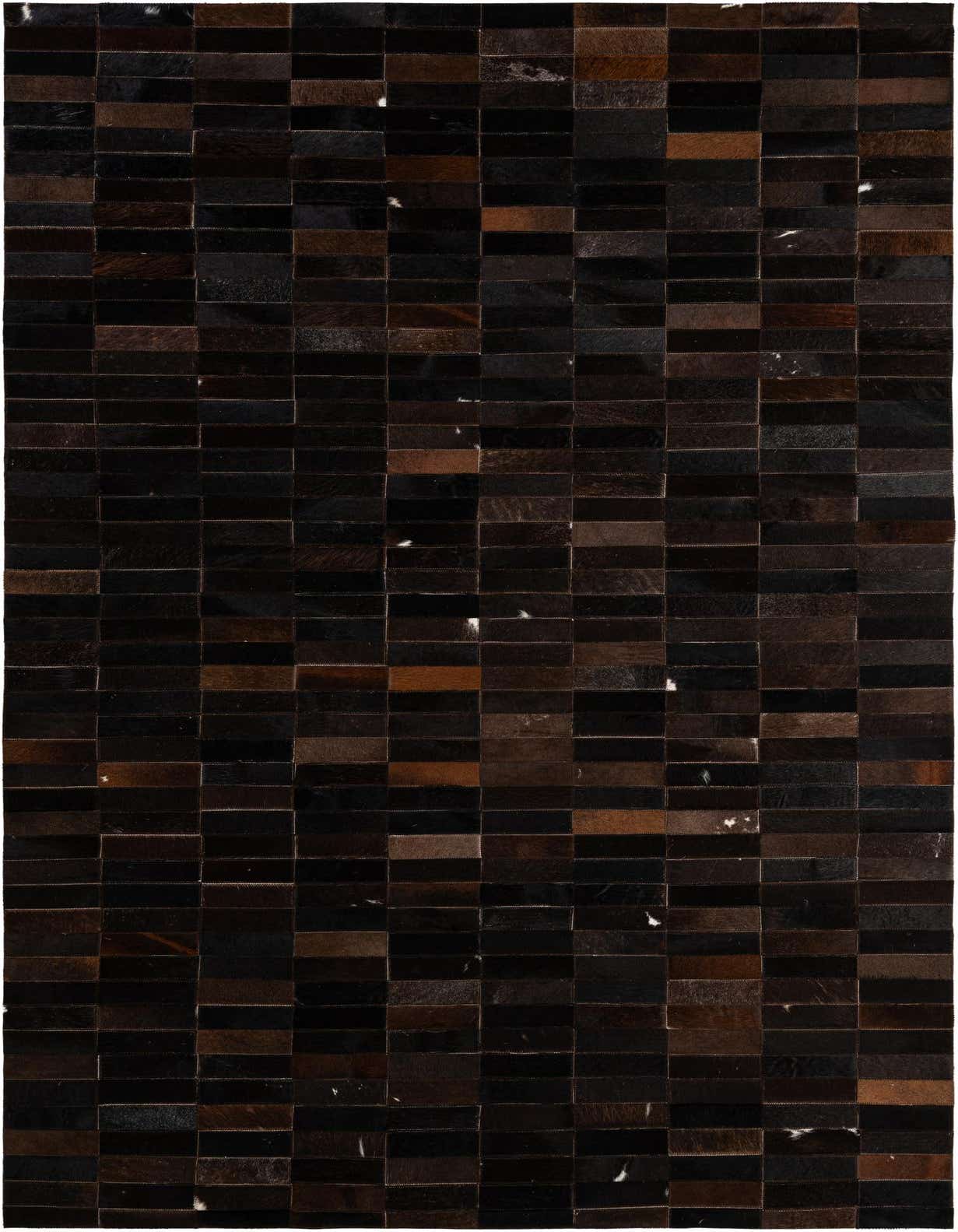 A rectangular 5x8 modern patchwork cowhide rug featuring varying shades of brown and tan rectangular patches.
