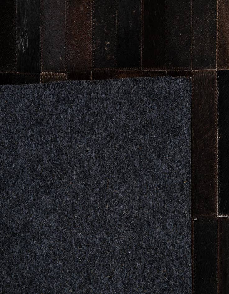 Detail image of  5' x 7' 11 Cowhide - Patchwork Rug