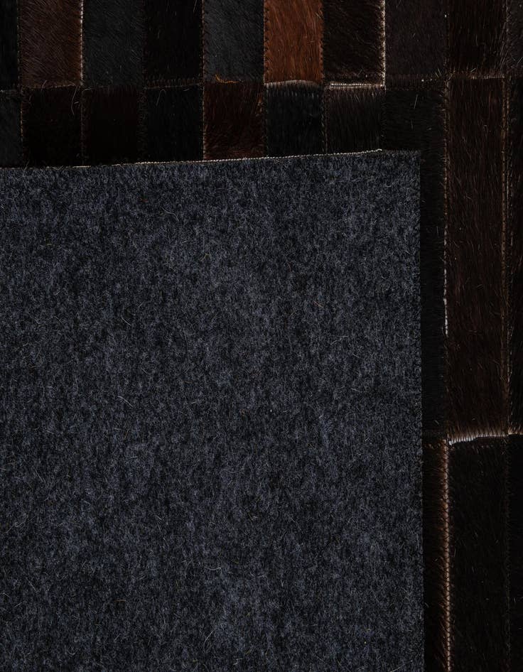 Detail image of  5' 2 x 8' Cowhide - Patchwork Rug