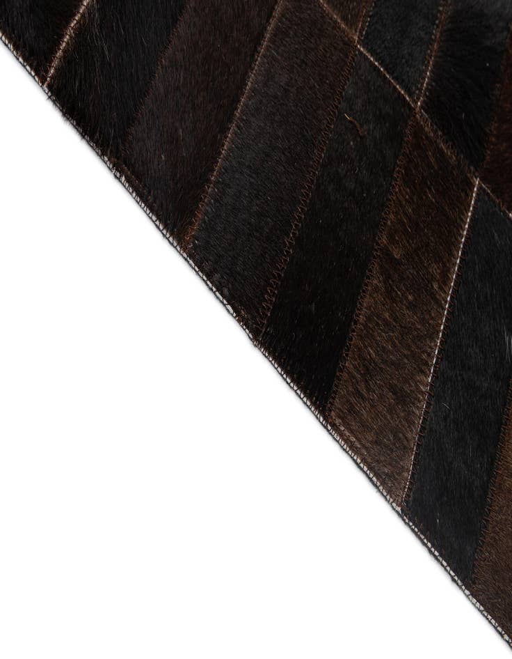 Detail image of  4' 11 x 8' 1 Cowhide - Patchwork Rug