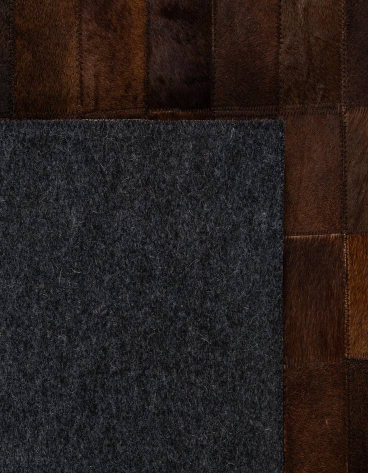 Detail image of  5' 2 x 8' Cowhide - Patchwork Rug