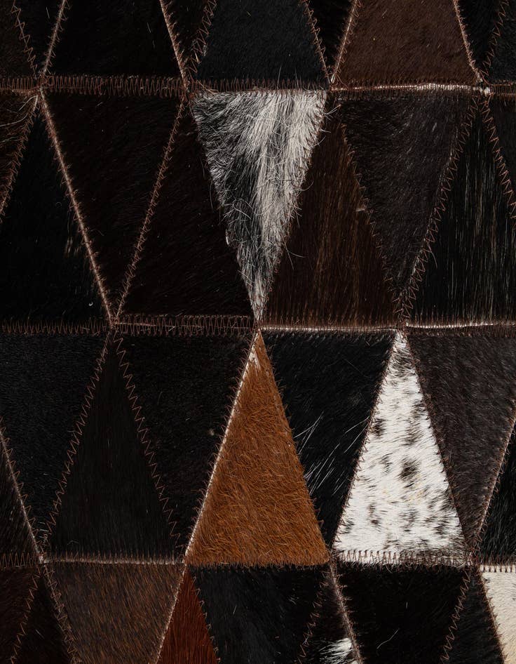 Detail image of  5' 1 x 8' 1 Cowhide - Patchwork Rug
