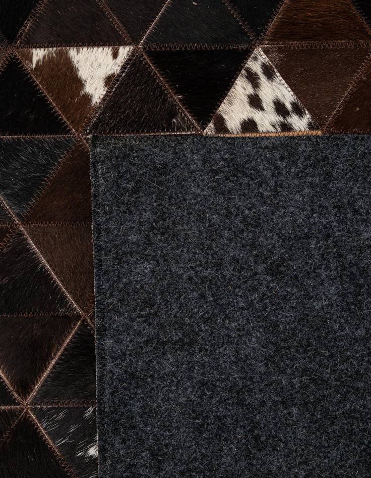 Detail image of  5' 1 x 8' 1 Cowhide - Patchwork Rug