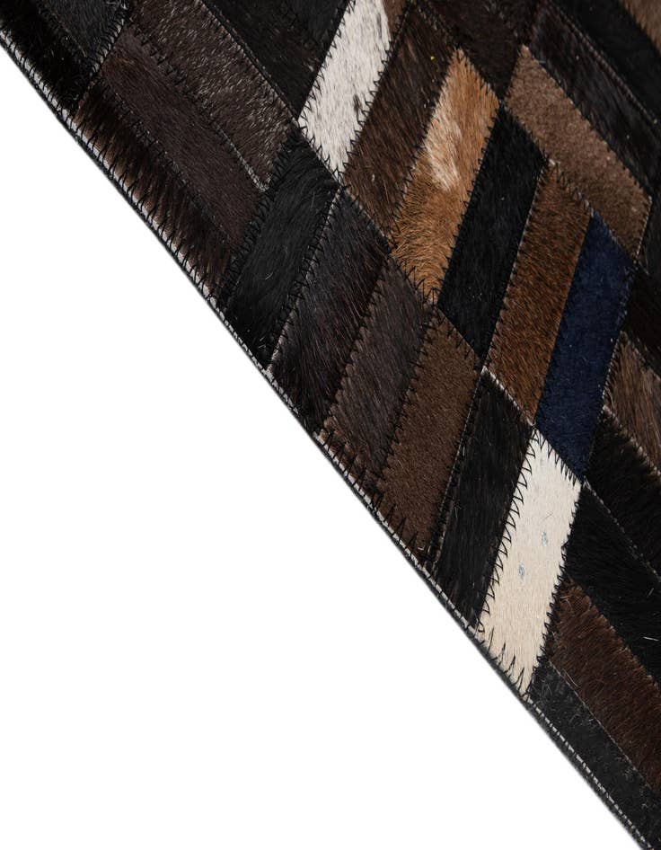 Detail image of  5' 1 x 8' Cowhide - Patchwork Rug