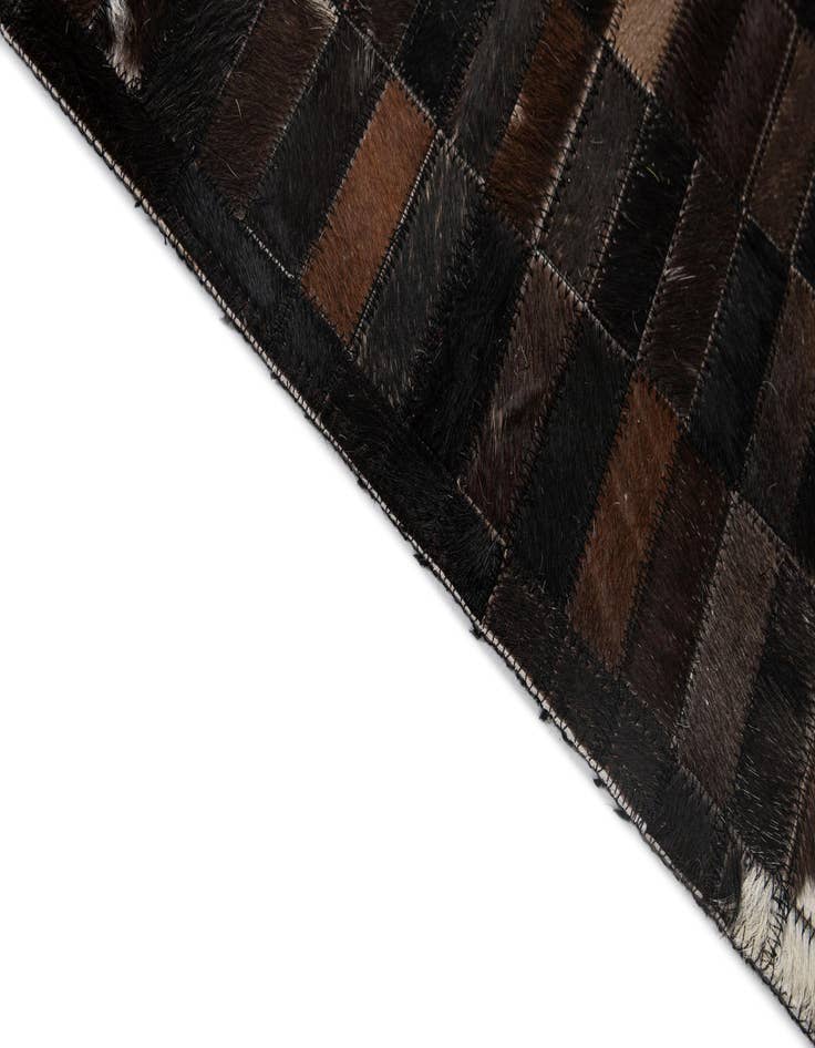 Detail image of  5' 2 x 7' 11 Cowhide - Patchwork Rug