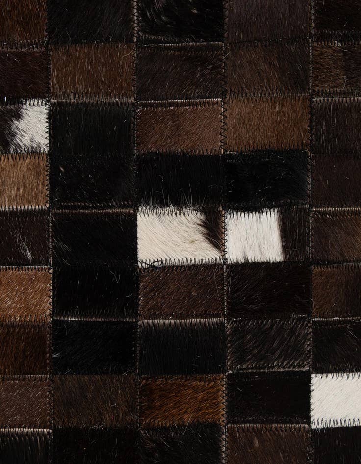 Detail image of  5' 2 x 7' 11 Cowhide - Patchwork Rug