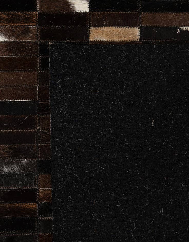 Detail image of  5' 2 x 7' 11 Cowhide - Patchwork Rug