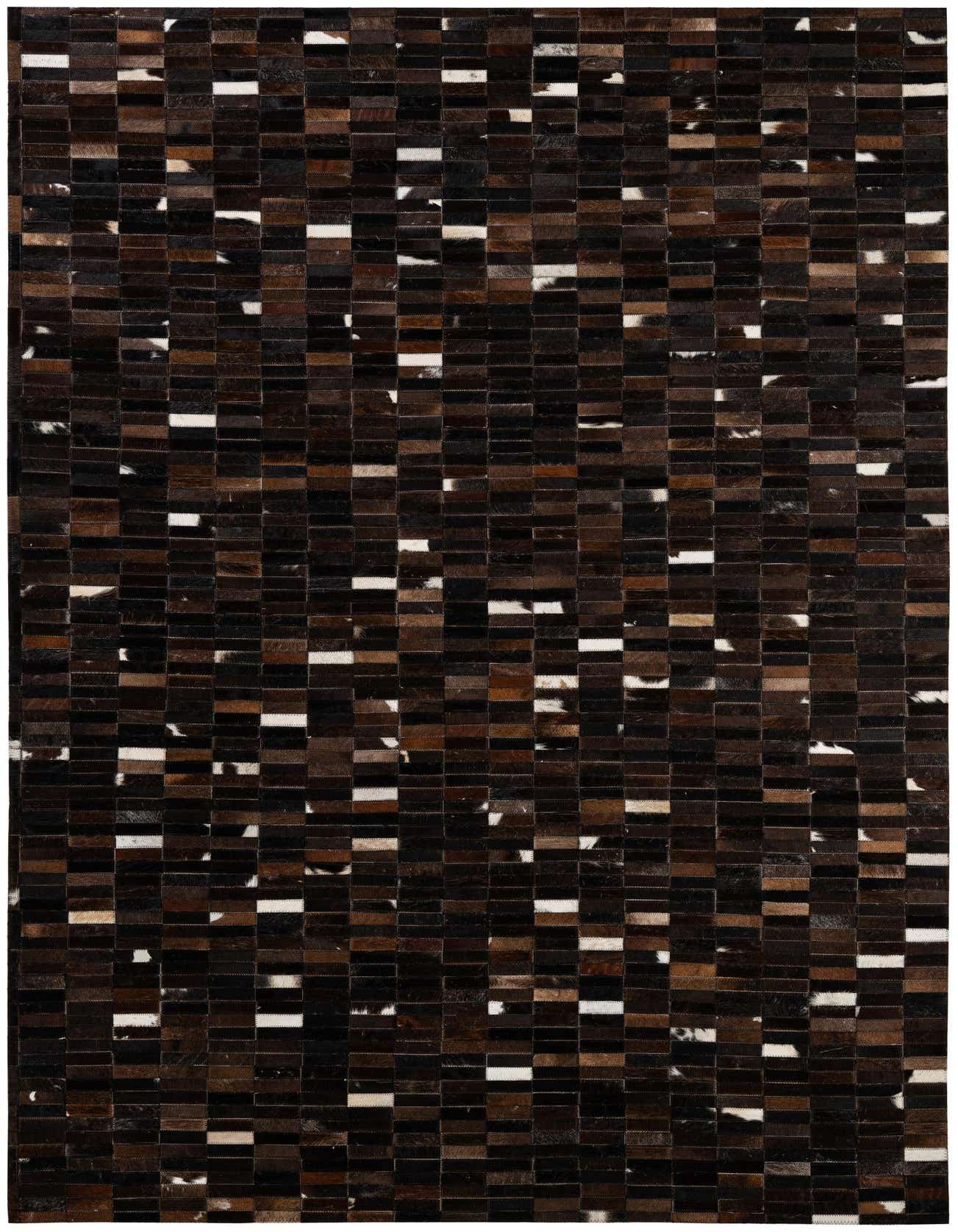 A 5x8 rectangular Cowhide Patchwork rug featuring a modern pattern of dark brown, tan, and white cowhide squares.