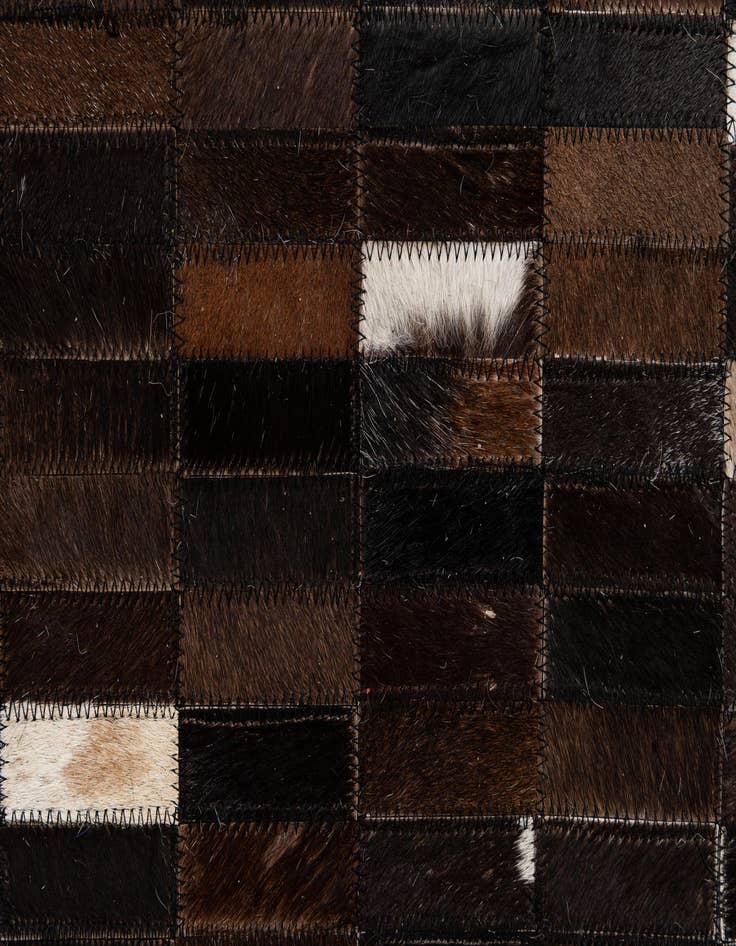Detail image of  5' 2 x 7' 11 Cowhide - Patchwork Rug