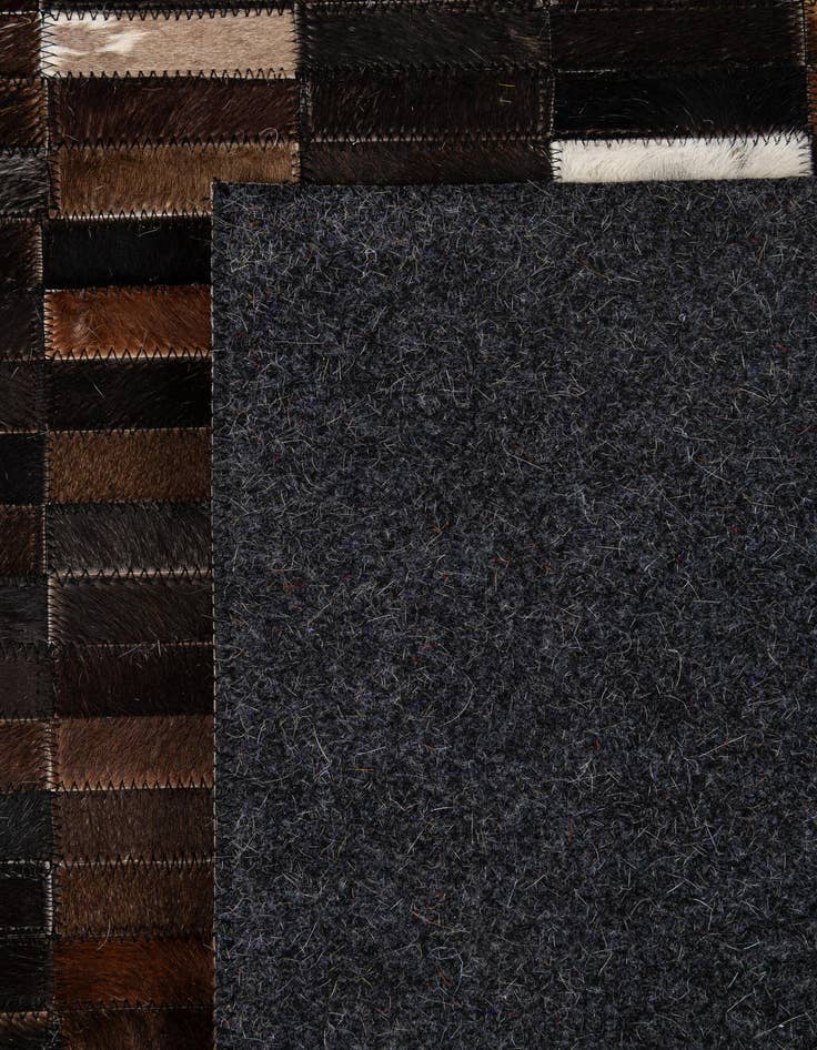 Detail image of  5' 2 x 7' 11 Cowhide - Patchwork Rug