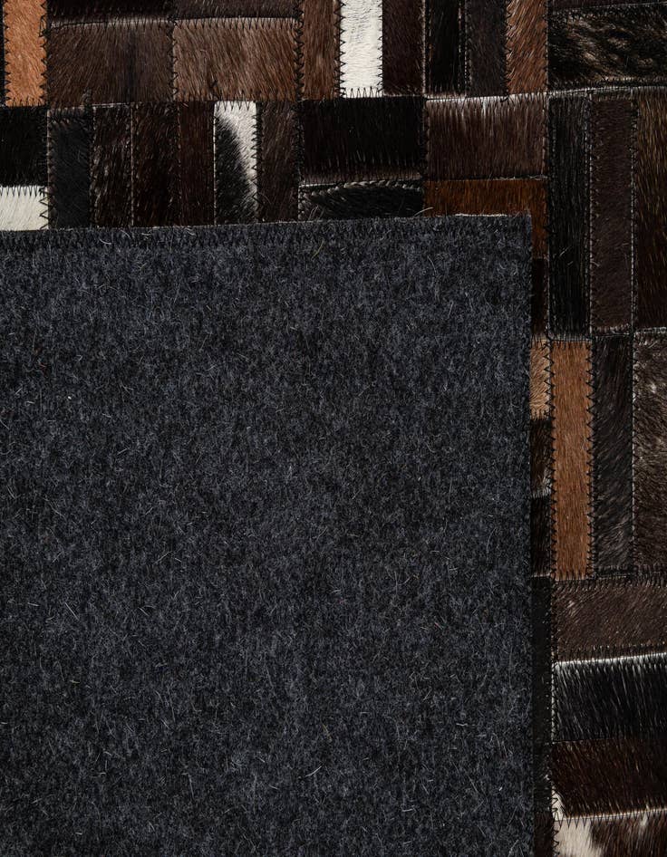Detail image of  5' 2 x 8' Cowhide - Patchwork Rug