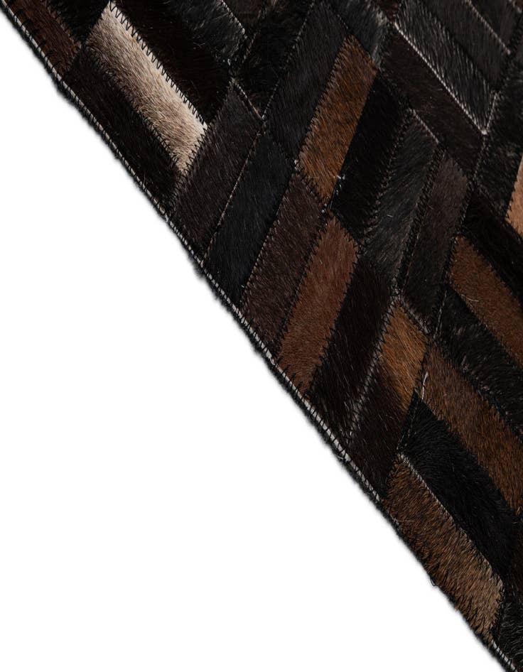 Detail image of  5' x 7' 11 Cowhide - Patchwork Rug