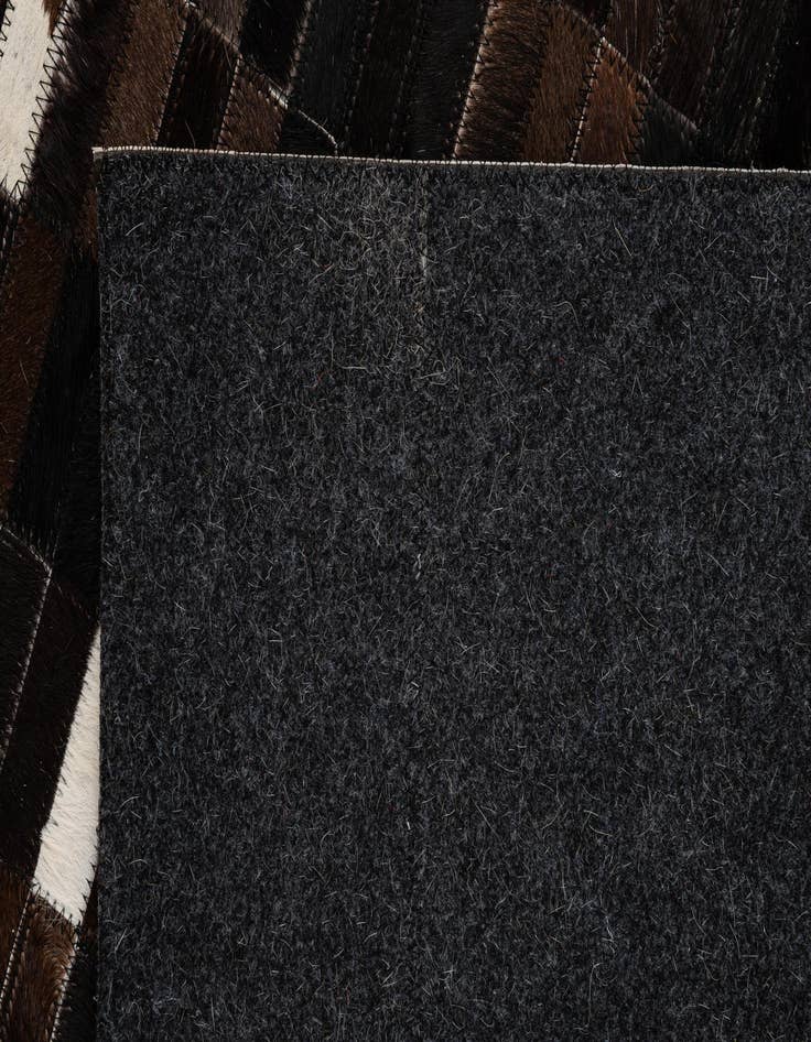 Detail image of  5' 2 x 8' Cowhide - Patchwork Rug