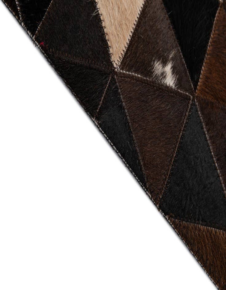 Detail image of  5' x 7' 11 Cowhide - Patchwork Rug