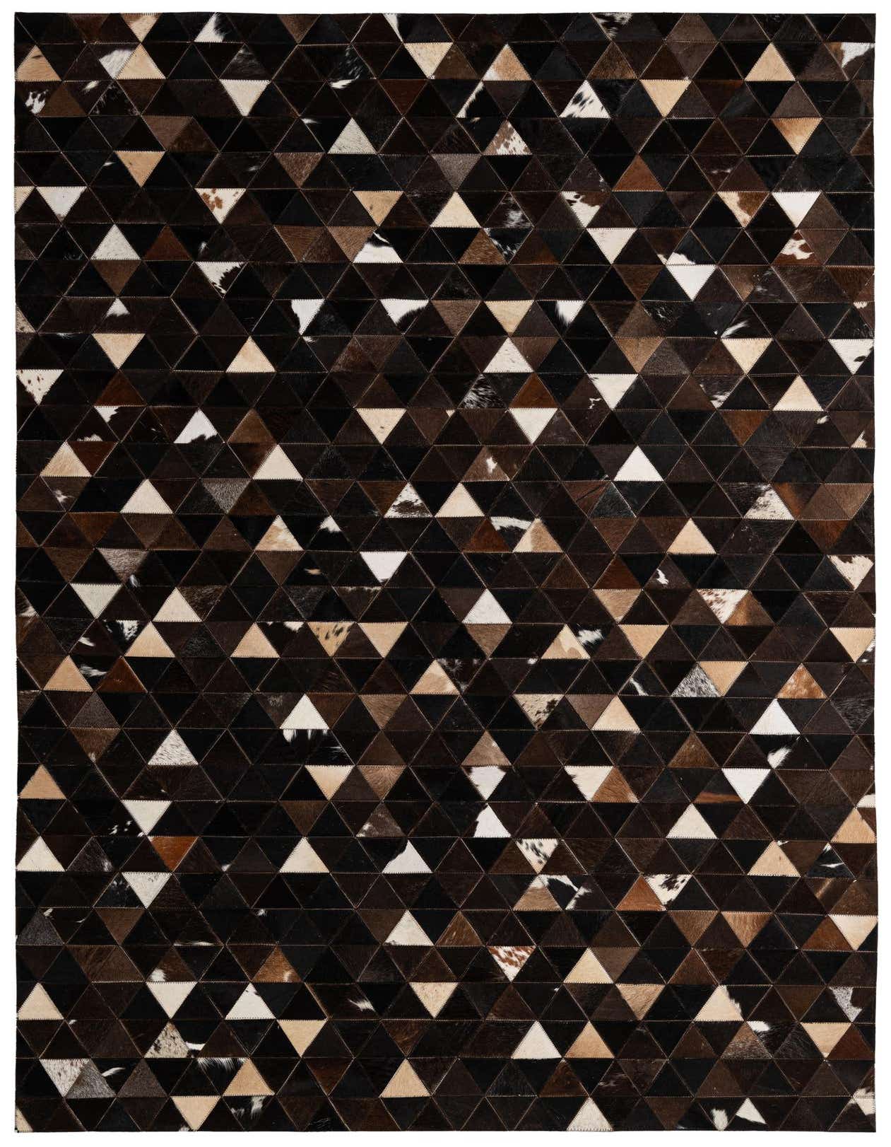 A 5x8 rectangular Cowhide - Patchwork rug featuring a modern geometric pattern of brown, tan, and white triangular cowhide patches.
