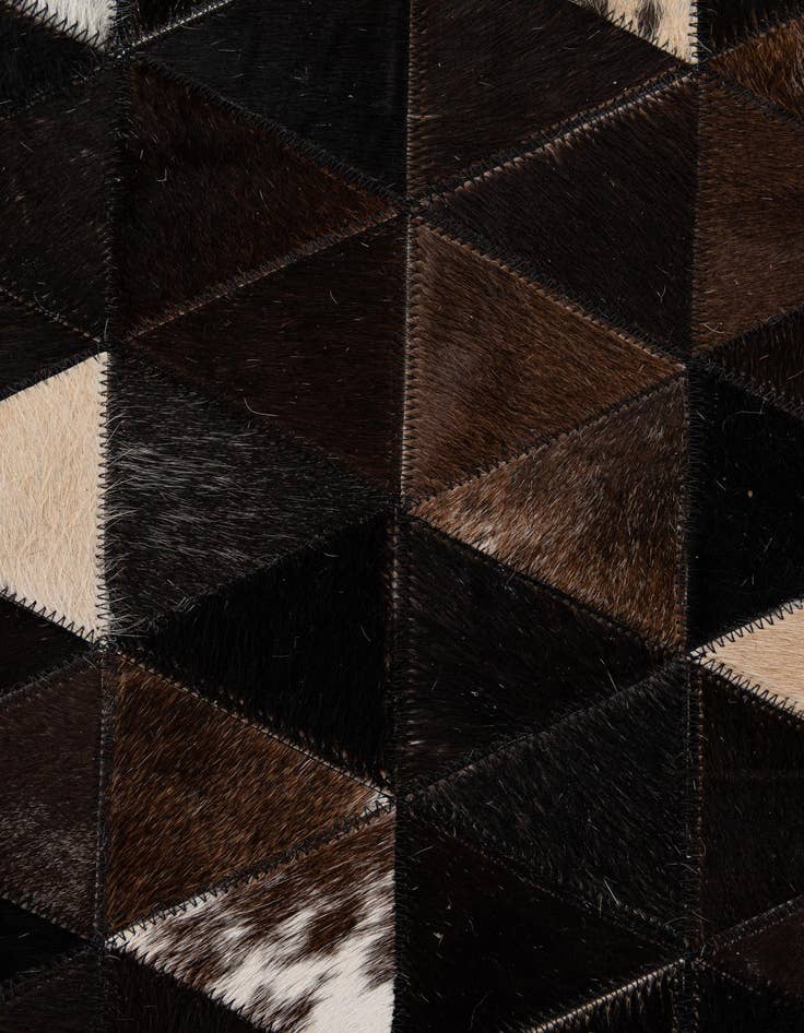 Detail image of  5' 1 x 7' 11 Cowhide - Patchwork Rug
