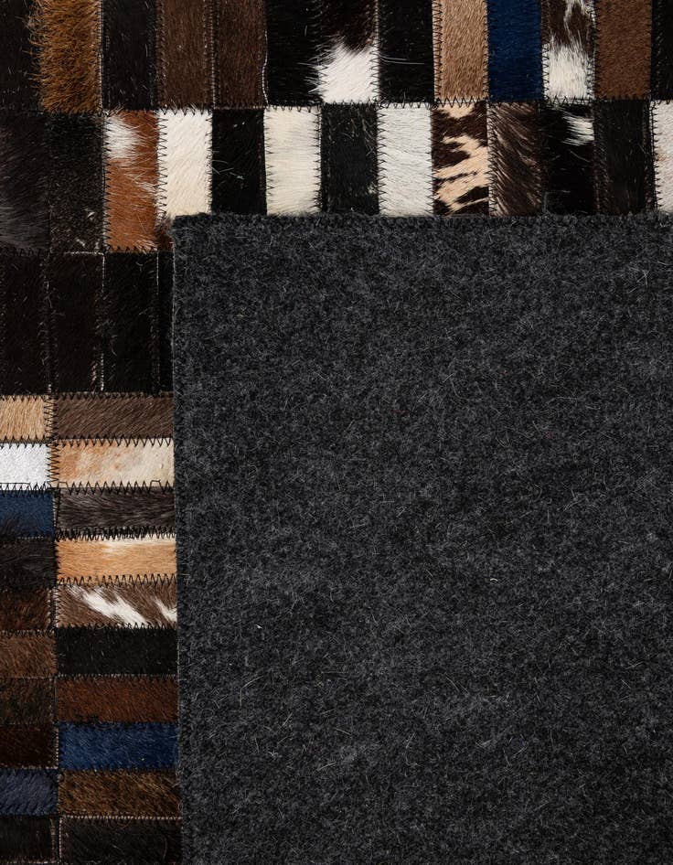 Detail image of  5' 1 x 8' Cowhide - Patchwork Rug