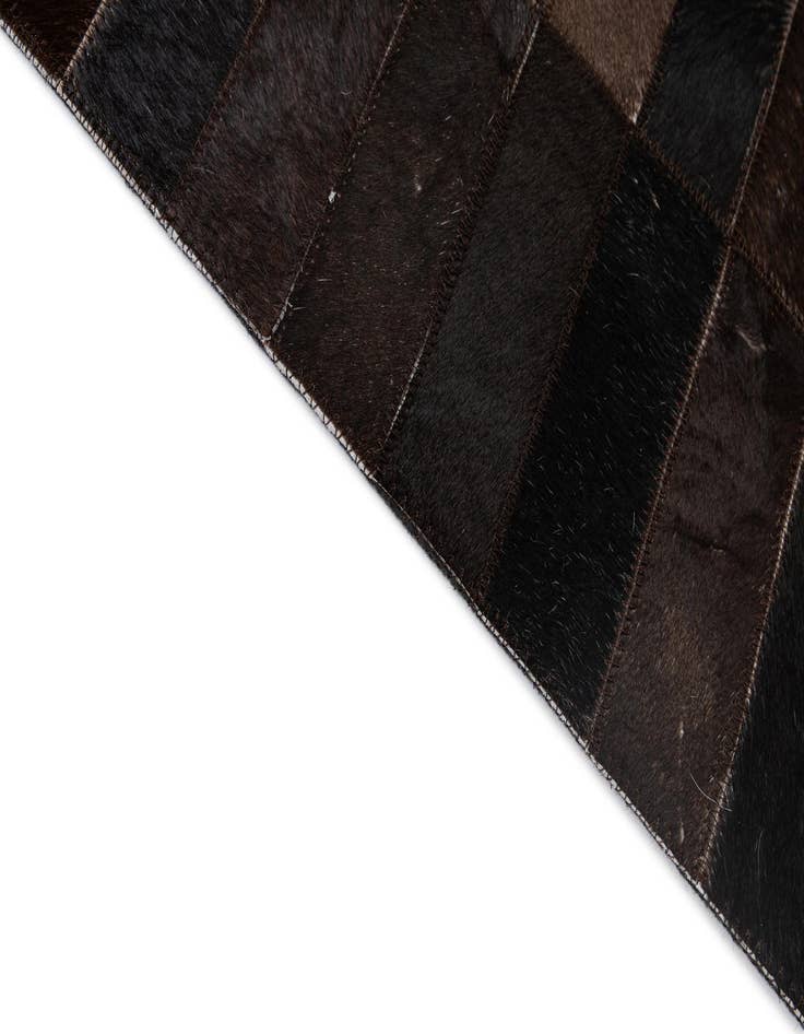 Detail image of  4' 11 x 8' 1 Cowhide - Patchwork Rug