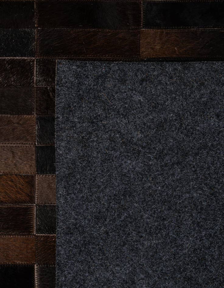 Detail image of  4' 11 x 8' 1 Cowhide - Patchwork Rug