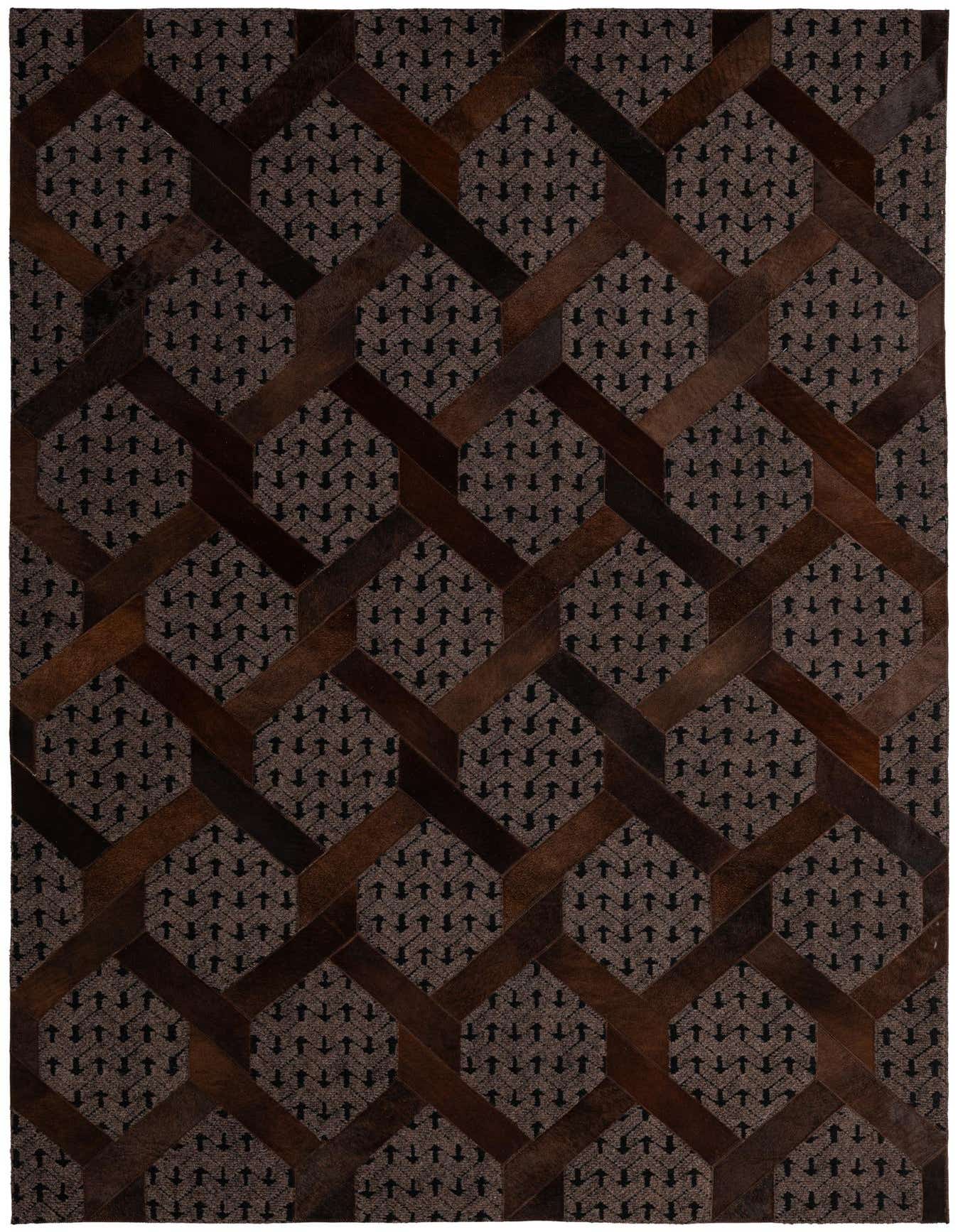 A 5x8 rectangular Cowhide - Patchwork rug featuring a modern abstract geometric pattern in varying shades of brown and tan.