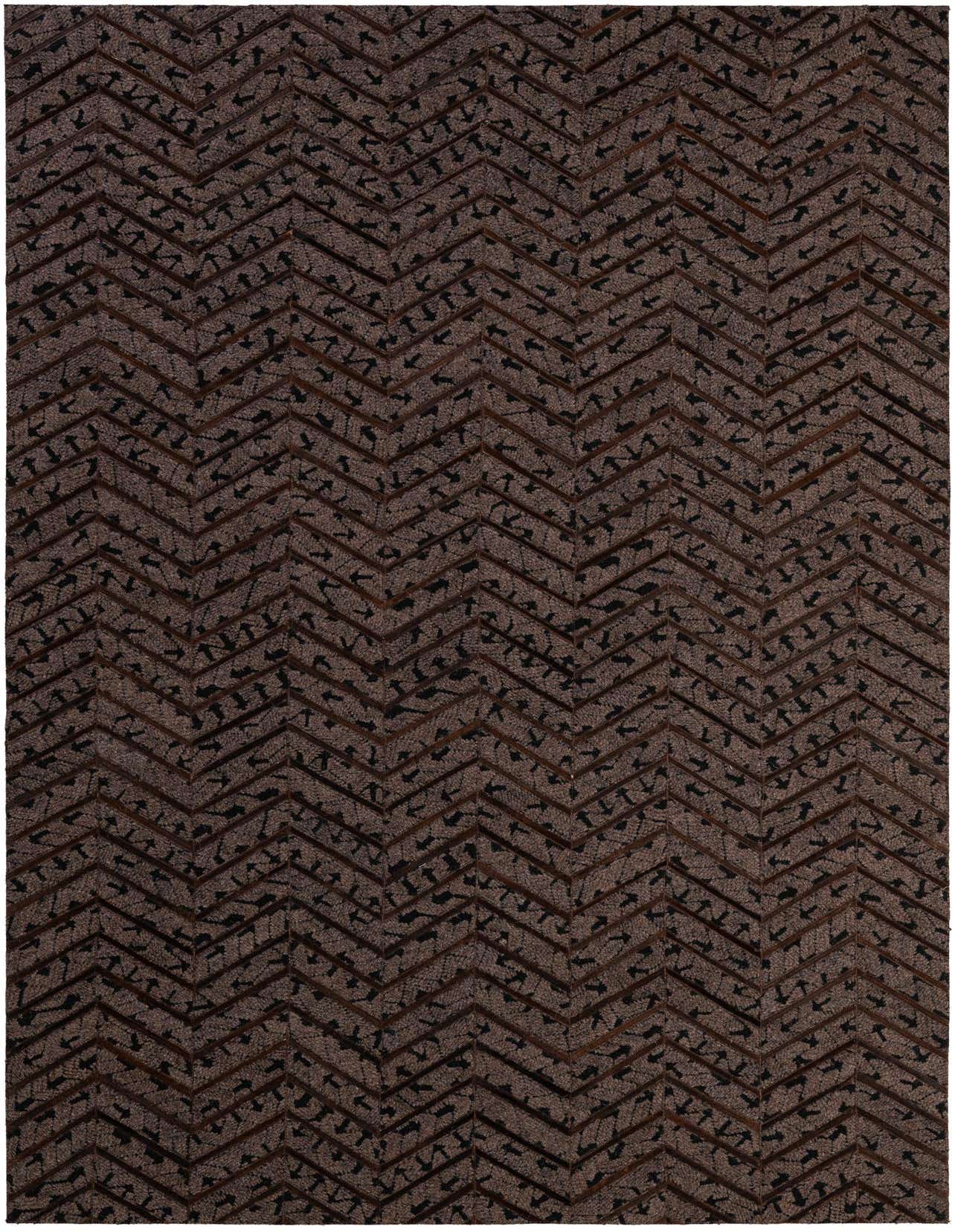 A 5x8 rectangular Cowhide & Leather rug in various shades of brown and tan, featuring a modern, abstract chevron pattern.