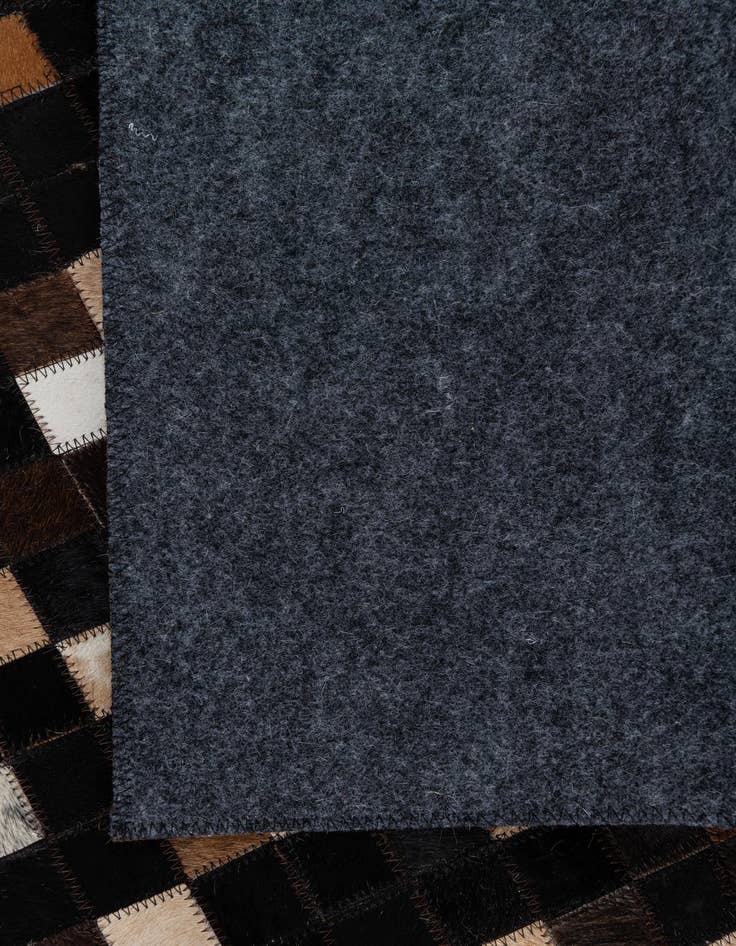 Detail image of  5' 1 x 8' Cowhide Leather Rug