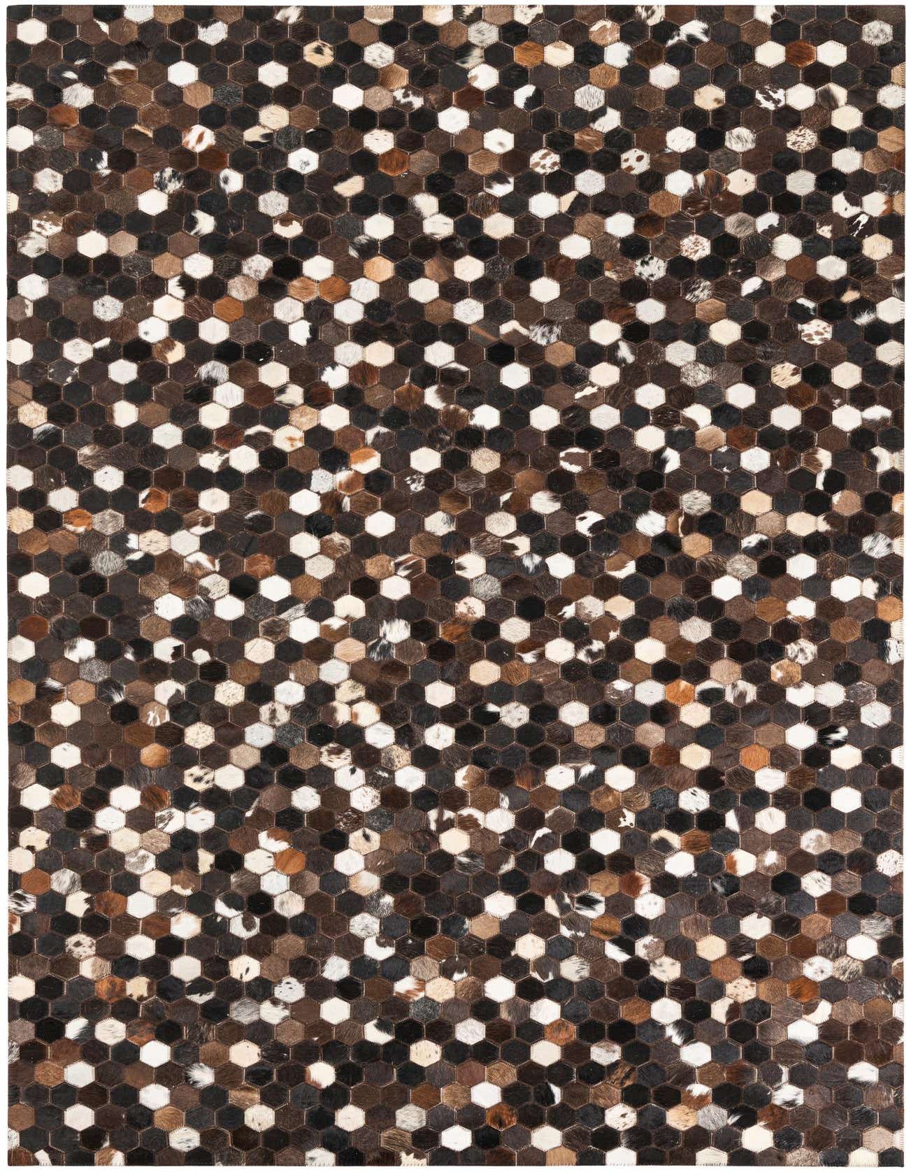 A 5x8 rectangular Cowhide Leather rug featuring a patchwork geometric pattern in varying shades of brown, tan, and white.