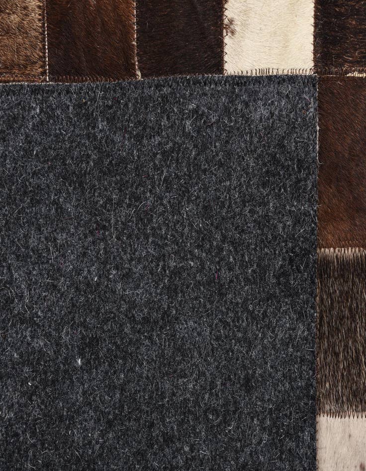 Detail image of  5' 5 x 7' 10 Cowhide Rug