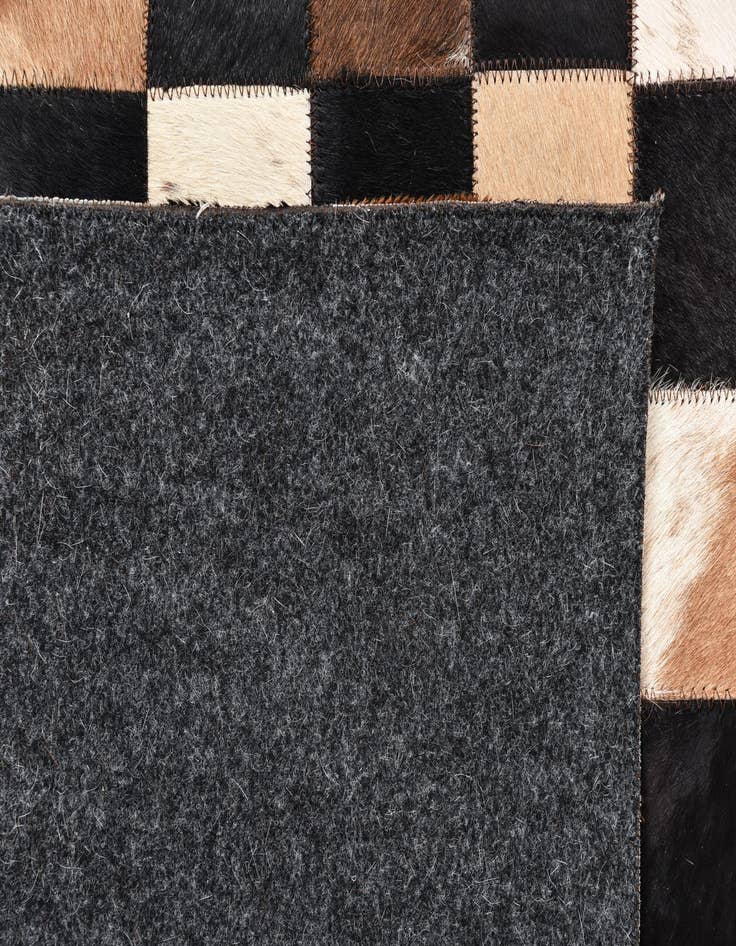 Detail image of  5' 1 x 7' 10 Cowhide Rug