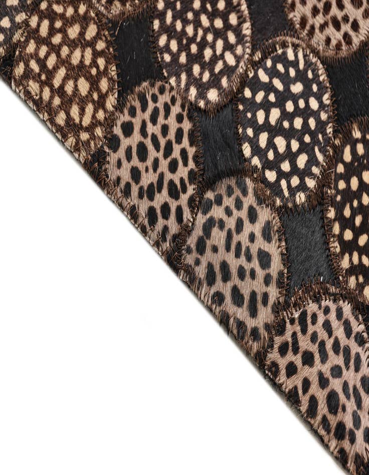 Detail image of  5' 1 x 7' 1 Cowhide Rug