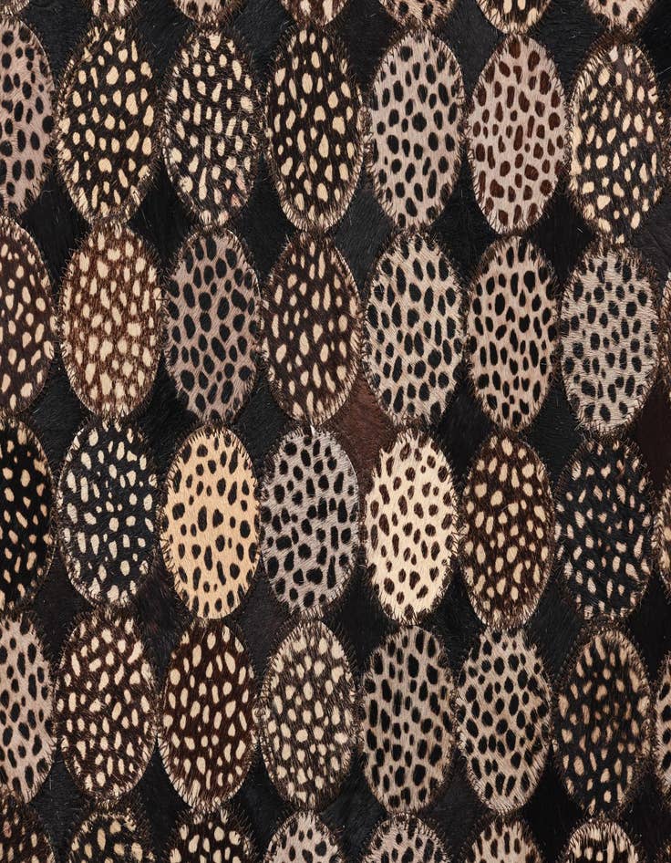 Detail image of  5' 1 x 7' 1 Cowhide Rug
