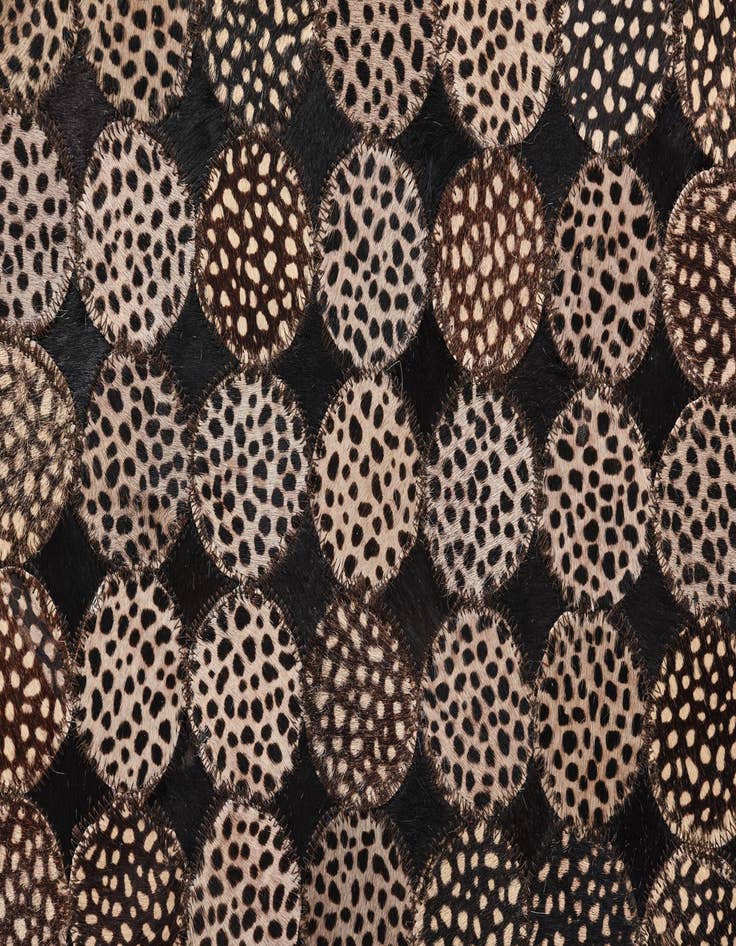 Detail image of  5' 1 x 7' 1 Cowhide Rug