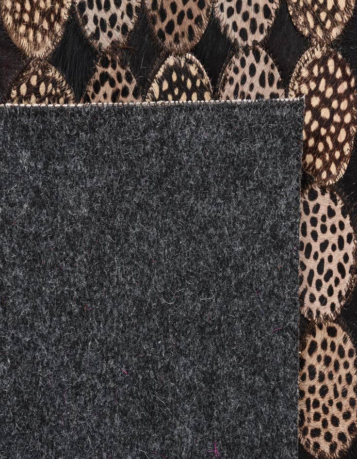 Detail image of  5' 1 x 7' 1 Cowhide Rug