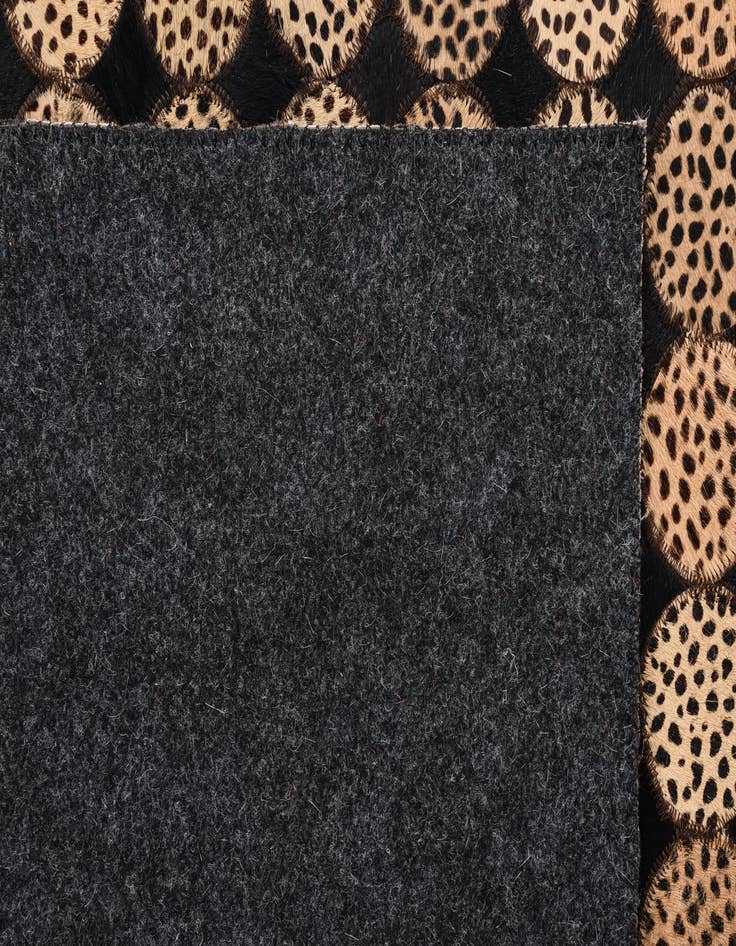 Detail image of  5' 3 x 7' 8 Cowhide Rug