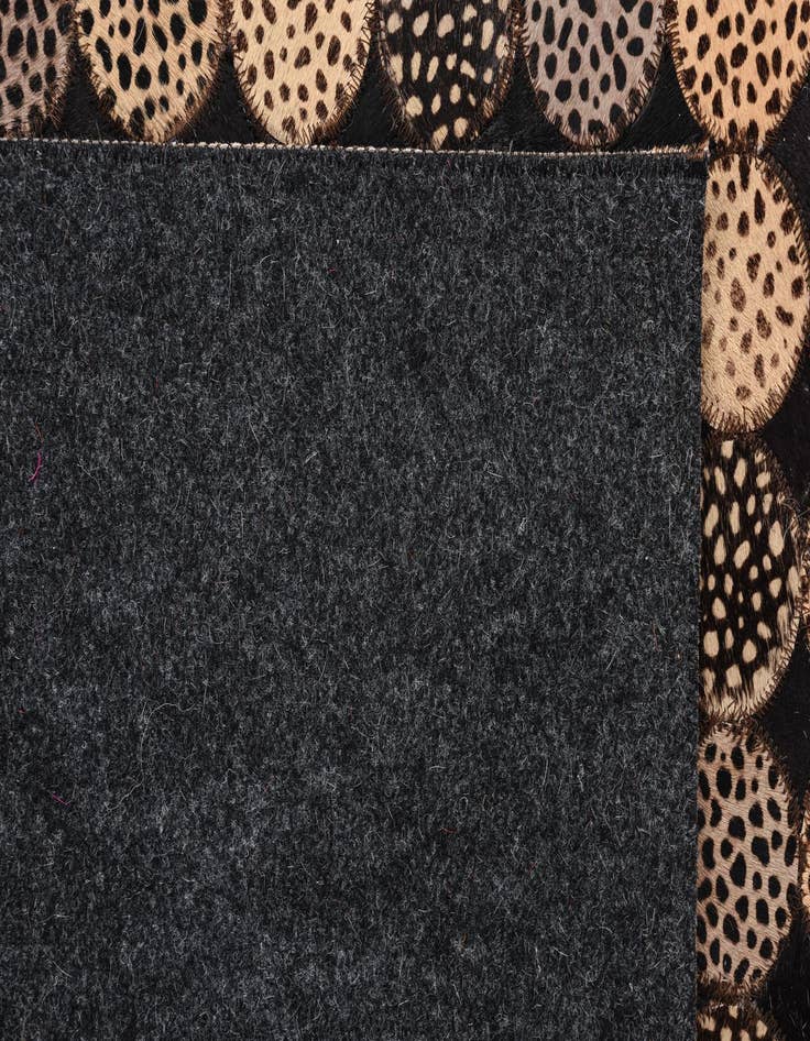 Detail image of  5' 2 x 7' 4 Cowhide Rug