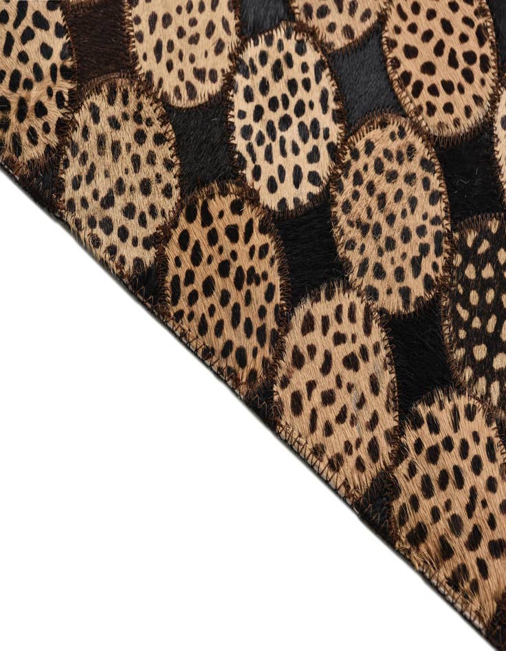 Detail image of  5' 2 x 7' 8 Cowhide Rug
