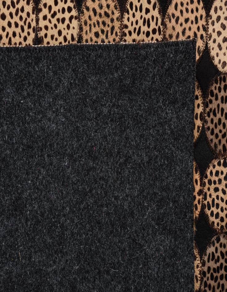 Detail image of  5' 2 x 7' 8 Cowhide Rug