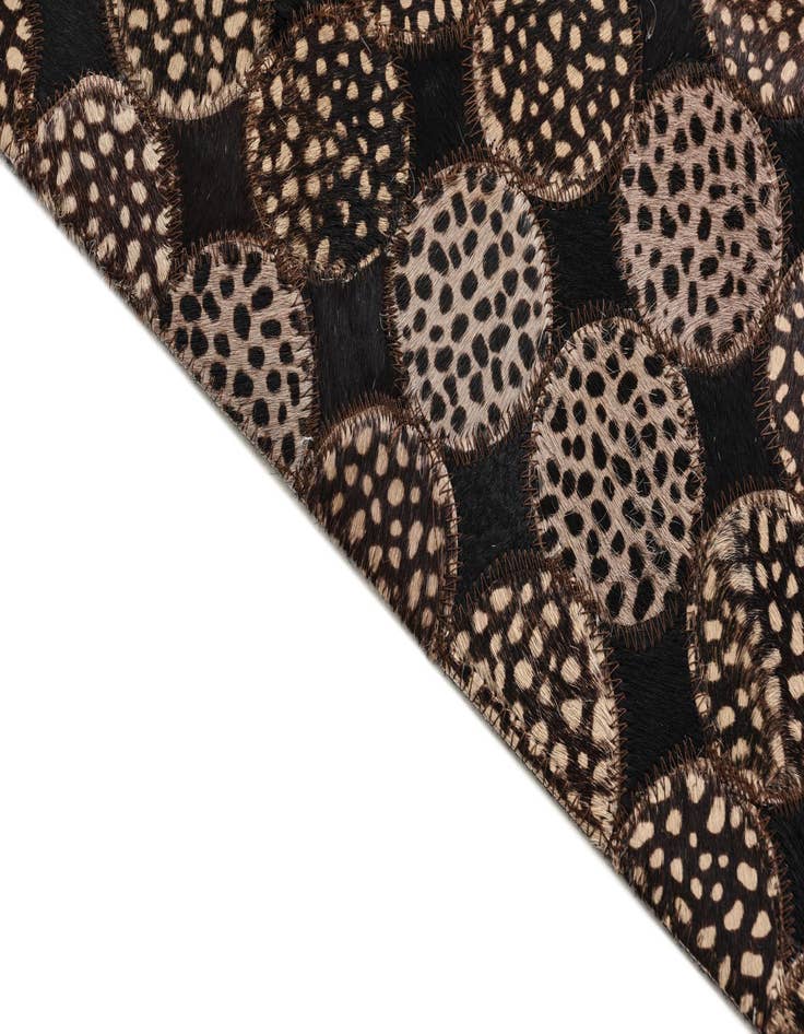 Detail image of  5' 3 x 7' 6 Cowhide Rug