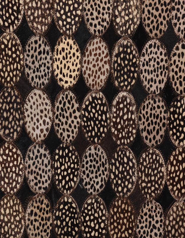 Detail image of  5' 3 x 7' 6 Cowhide Rug