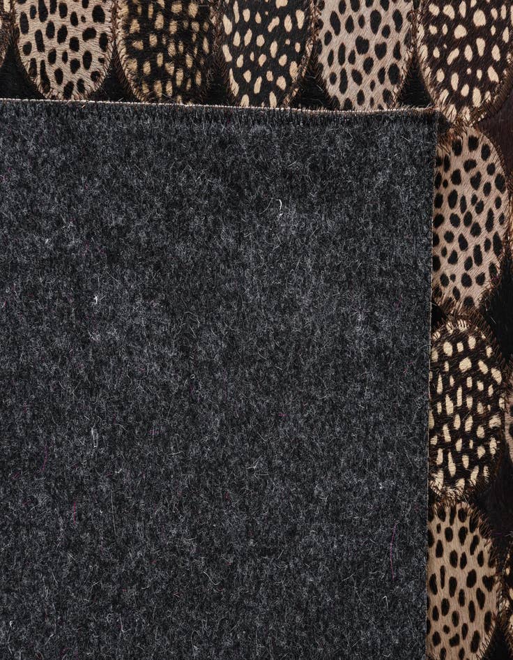 Detail image of  5' 3 x 7' 6 Cowhide Rug