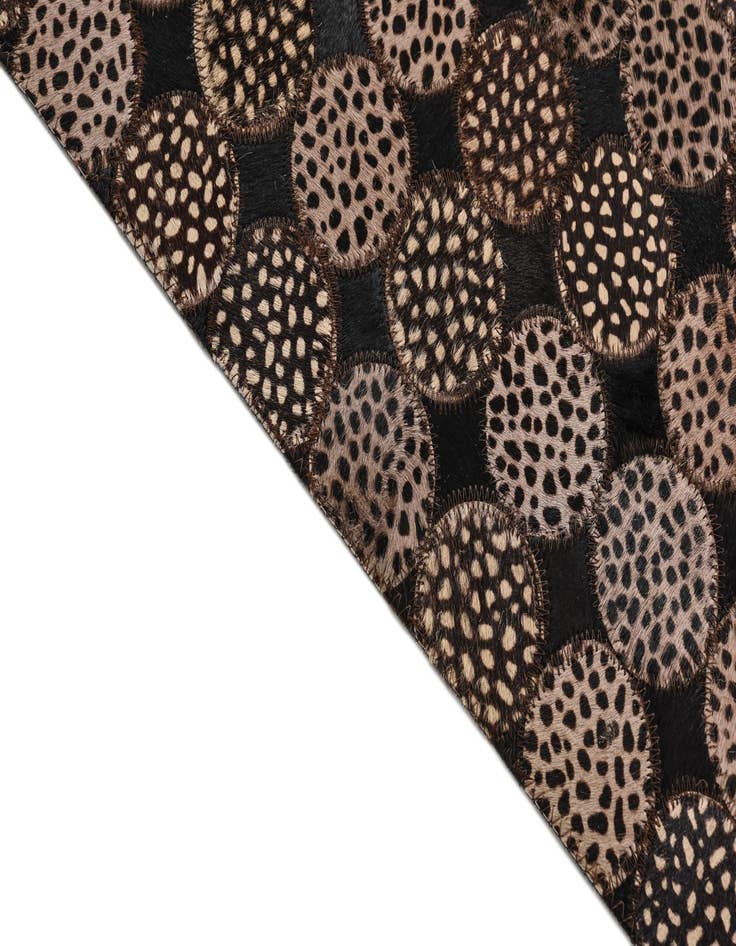 Detail image of  5' 3 x 7' 6 Cowhide Rug