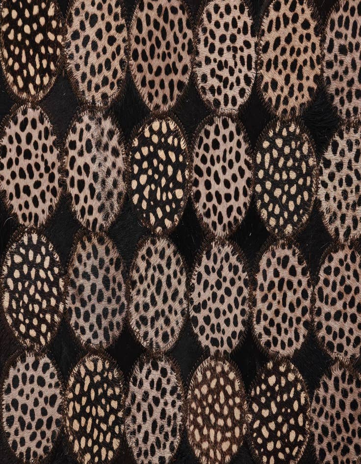 Detail image of  5' 3 x 7' 6 Cowhide Rug