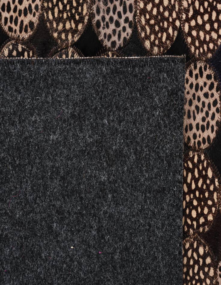 Detail image of  5' 3 x 7' 6 Cowhide Rug