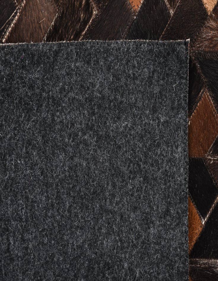 Detail image of  4' 8 x 6' 6 Cowhide Rug